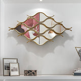 Moderner unregelmäßiger geometrischer abstrakter Wandspiegel aus goldfarbenem Metall