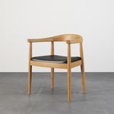 現代曲げられた背部食事の椅子によって装飾される革クルミの木の肘掛け椅子