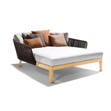 Sofá cama de exterior de ratán de estilo moderno con cojín en blanco y café