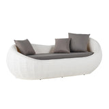 Sofá de exterior redondo de ratán tejido blanco con cojín y almohada y respaldo curvo